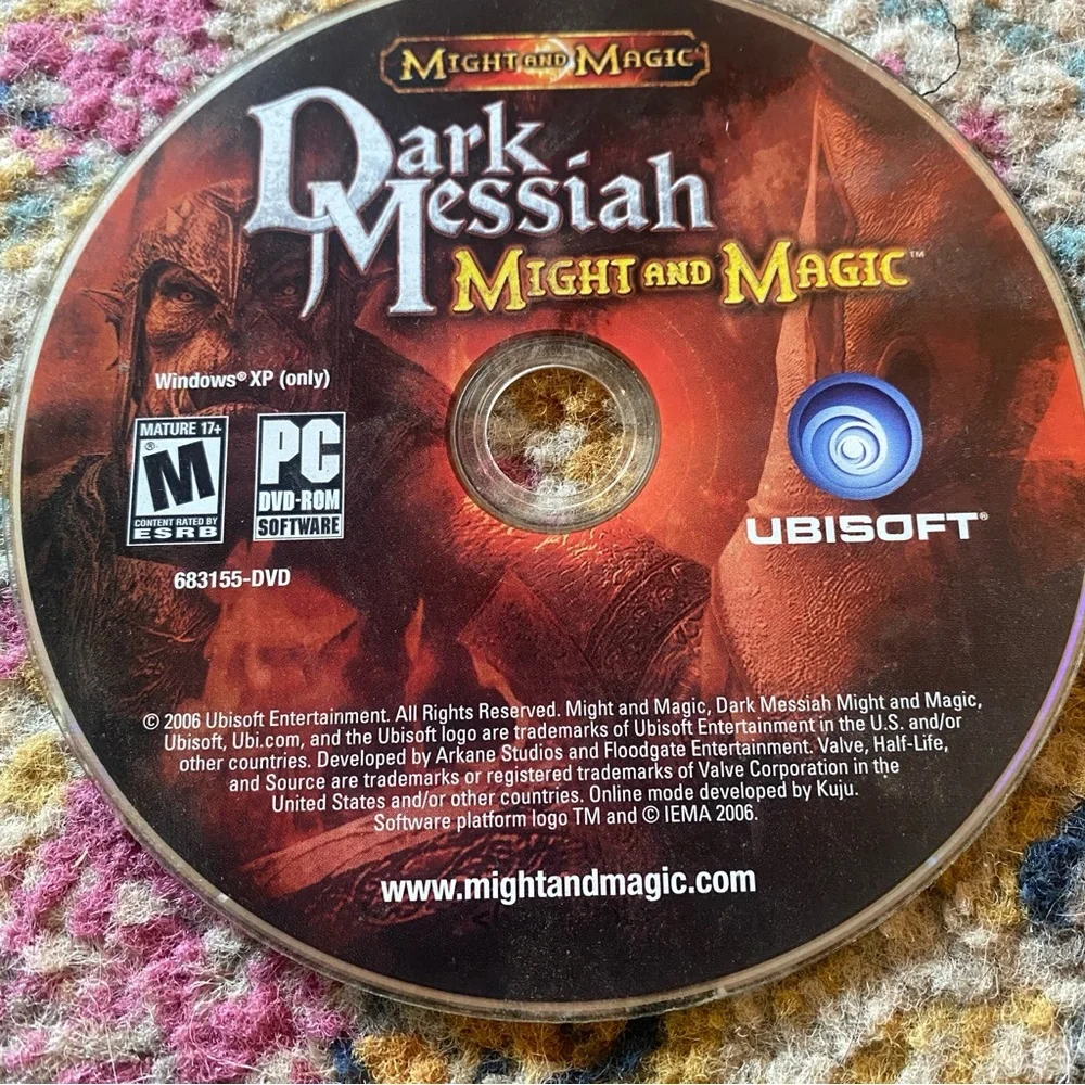 Blizzard Warcraft and Ubisoft Dark Messiah PC Game Discs